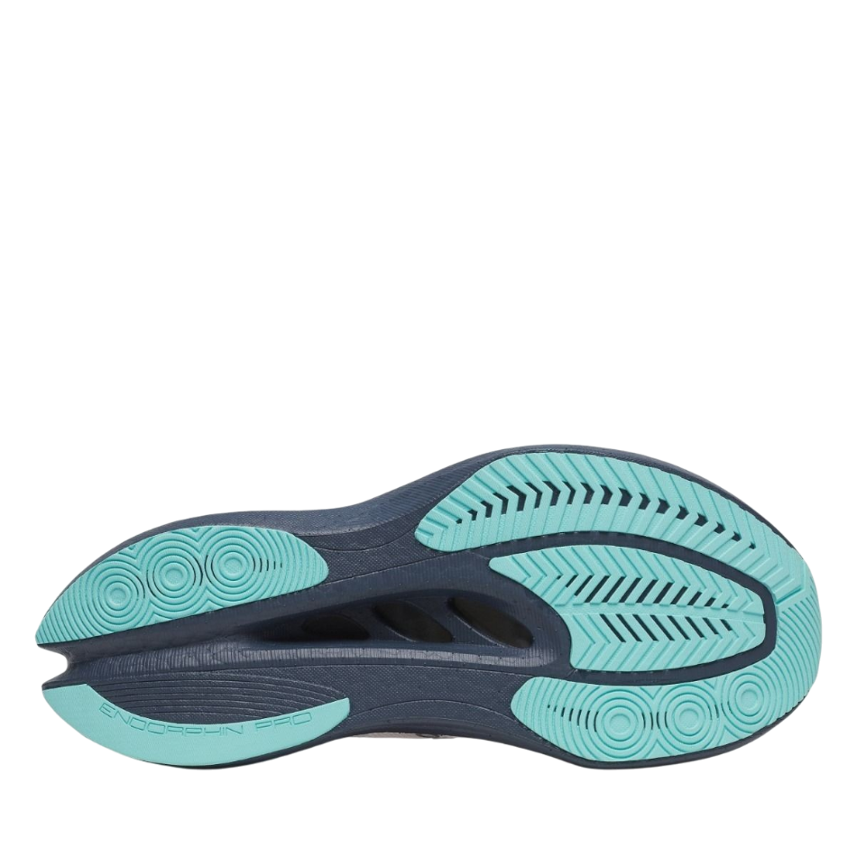 Up & Running Saucony Endorphin Pro 5 women's running shoe showing the navy and teal PWRTRAC rubber outsole design