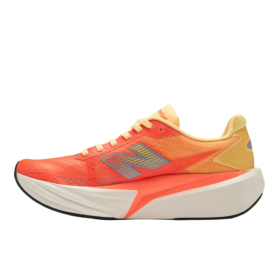 New Balance Women's FuelCell Rebel v5 Running Shoes in Tangerine Heat SS26