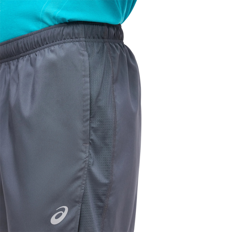 Up & Running ASICS men's carrier grey running shorts with mesh side panels and reflective logo detail.