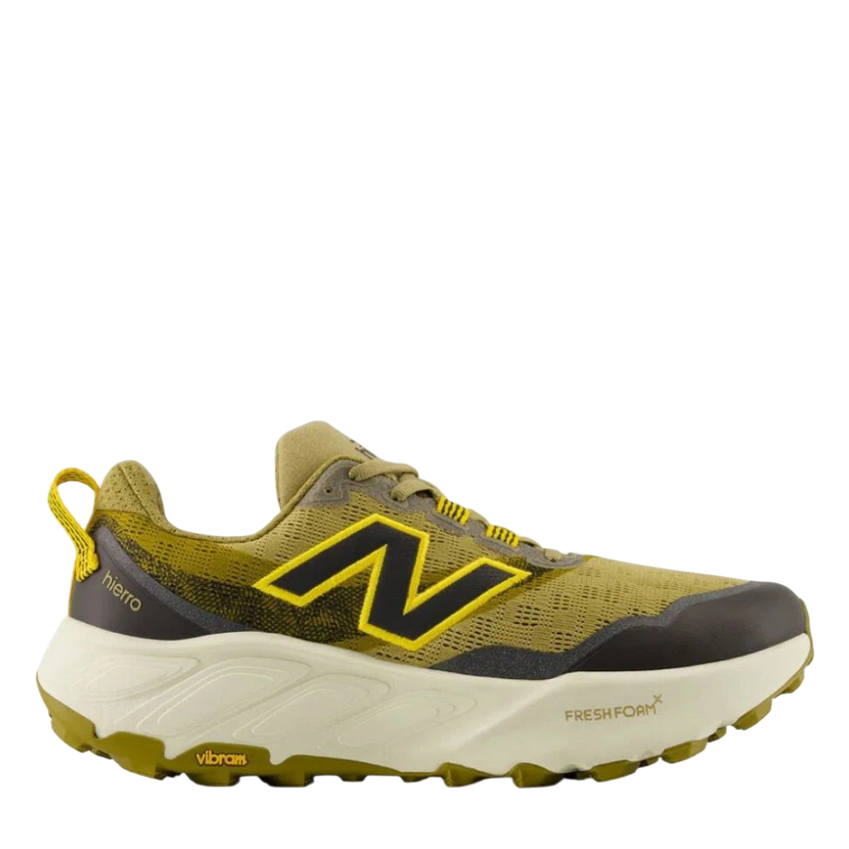 Up & Running New Balance Hierro v9 trail running shoe in quicksand, orange, and black with a thick Fresh Foam midsole.