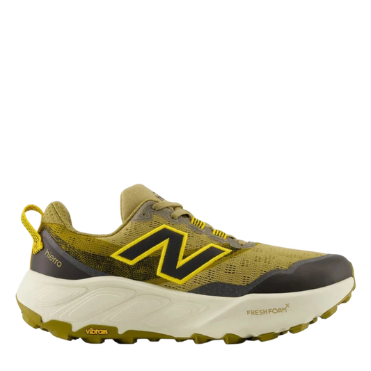 Up & Running New Balance Hierro v9 trail running shoe in quicksand, orange, and black with a thick Fresh Foam midsole.