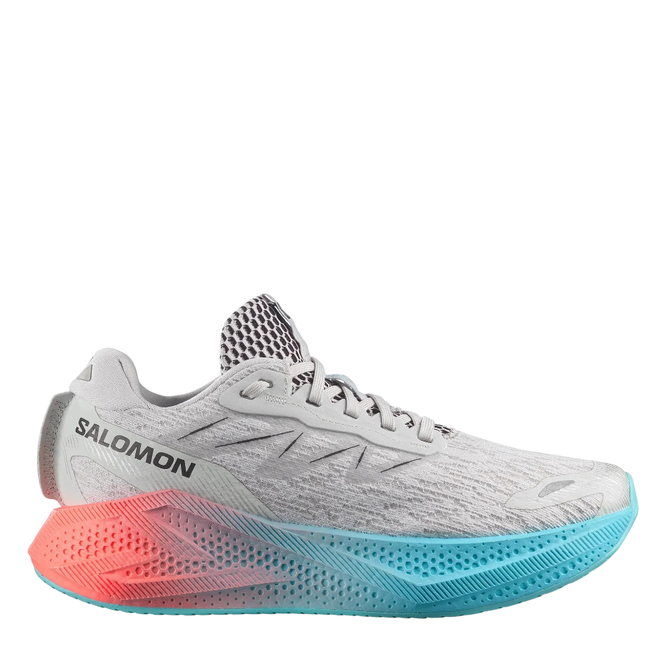 Up & Running Salomon Women's Aero Glide 4 running shoe in grey violet, black, and blue with high-stack foam midsole.