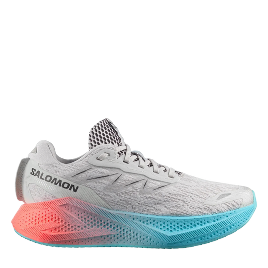 Up & Running Salomon Women's Aero Glide 4 running shoe in grey violet, black, and blue with high-stack foam midsole.