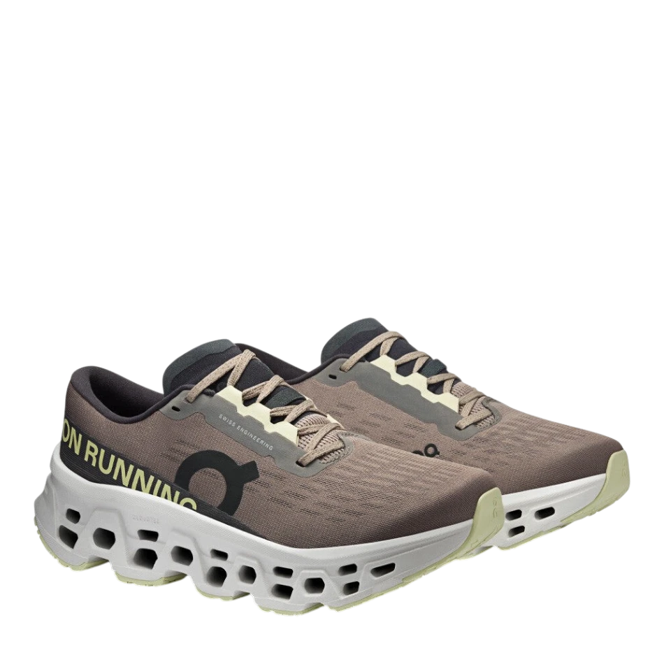 Up & Running On Women's Cloudmonster 3 running shoes in cinder and ivory with triple-layered CloudTec cushioning.