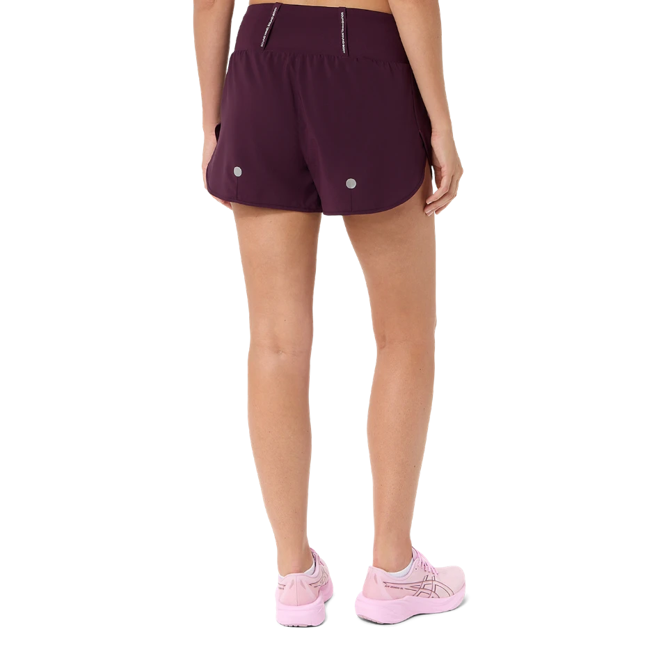 Up & Running ASICS women's dark aubergine 3.5-inch running shorts with back storage pockets, rear view