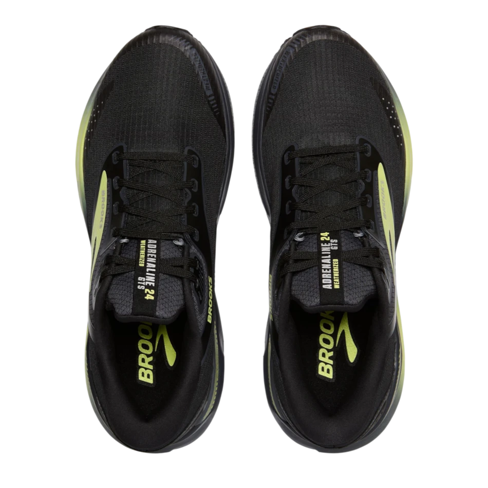 Up & Running Brooks Adrenaline GTS 24 weatherized running shoes in black and yellow with nitrogen-infused foam.