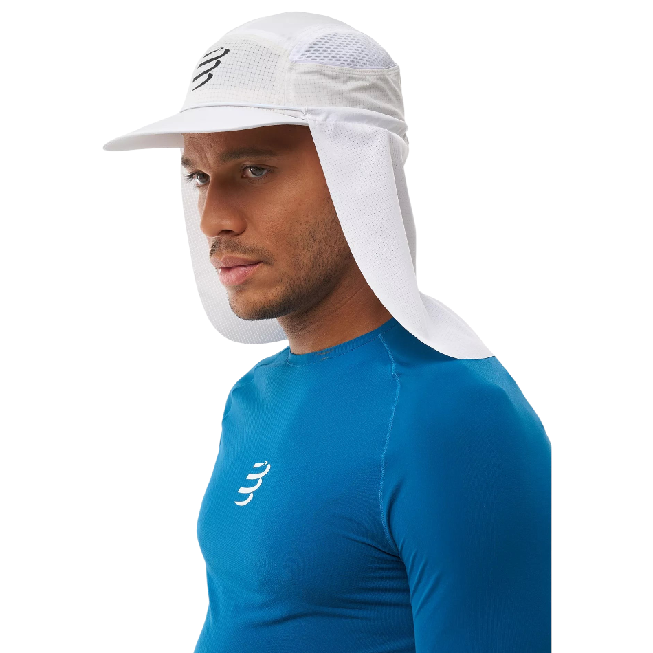 Up & Running Compressport white racing cap with removable neck shade worn by a male athlete for sun protection
