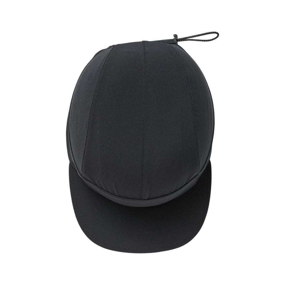 Up & Running Janji AFO Hyperlight running cap in midnight black with an adjustable bungee cord back closure.