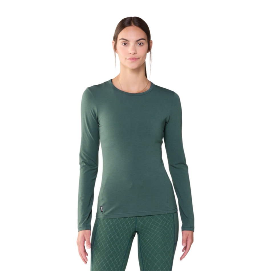 Up & Running Janji women's Circa Daily long sleeve running top in Atlantis green, featuring quick-drying fabric.
