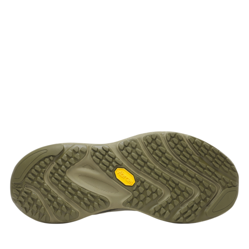 Up & Running Merrell ProMorph women's trail running shoe outsole in light olive with Vibram traction lugs