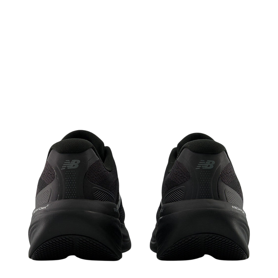 Up & Running New Balance 860 V15 men's black running shoes, rear view showing cushioned heel and Fresh Foam X midsole