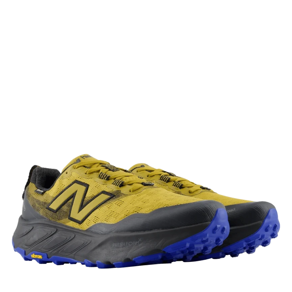 Up & Running New Balance Hierro v9 GORE-TEX trail running shoes in basil oil and black with a rugged Vibram outsole.