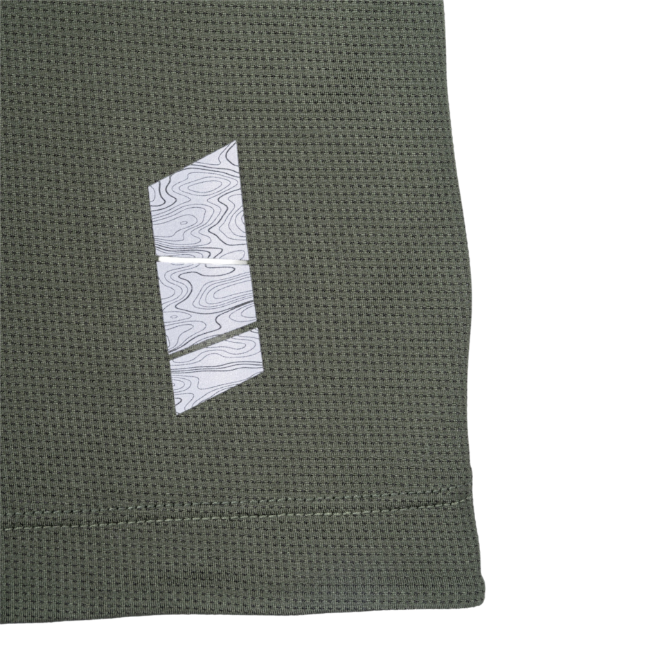 Up & Running Ronhill men's tech running t-shirt in kelp green with a reflective topographic pattern logo detail.